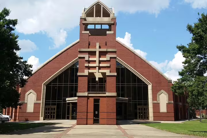 Ebenezer Baptist Church brick facade with cross, part of Atlanta's Martin Luther King Jr historic site