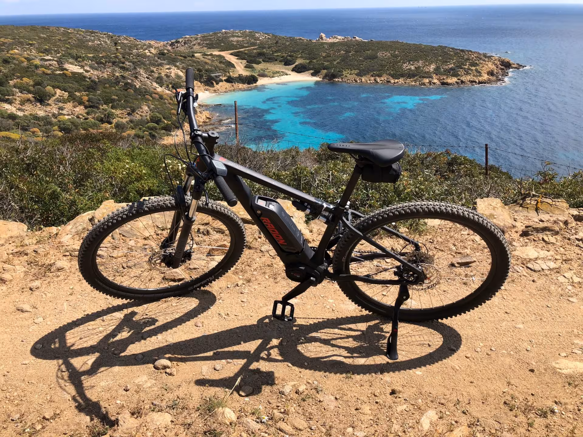 E-bike overlooking the stunning Asinara coastline, offering a breathtaking view for adventurers from Porto Torres.