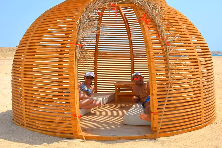 Relaxing beach cabana on Eden Island day trip from Hurghada, Red Sea escape with lunch and water sports