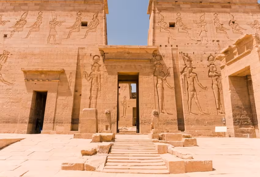 Edfu Temple entrance with carved hieroglyphs, featured on Cairo Aswan Abu Simbel Luxor air tour