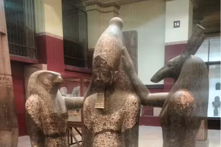 Ancient Egyptian statue display in Cairo Museum, cultural stop on 6-day Egypt Cairo pyramids Aswan felucca tour