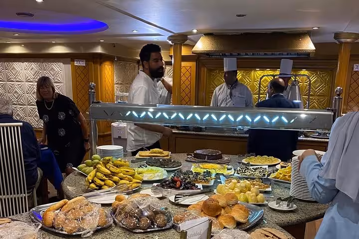Egypt Nile cruise buffet dinner with fresh bread, fruit and desserts on 8-day Cairo Aswan Luxor tour
