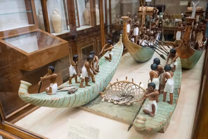 Ancient Egyptian boat model exhibit at the Egyptian Museum Cairo, highlight of private guided tour itinerary
