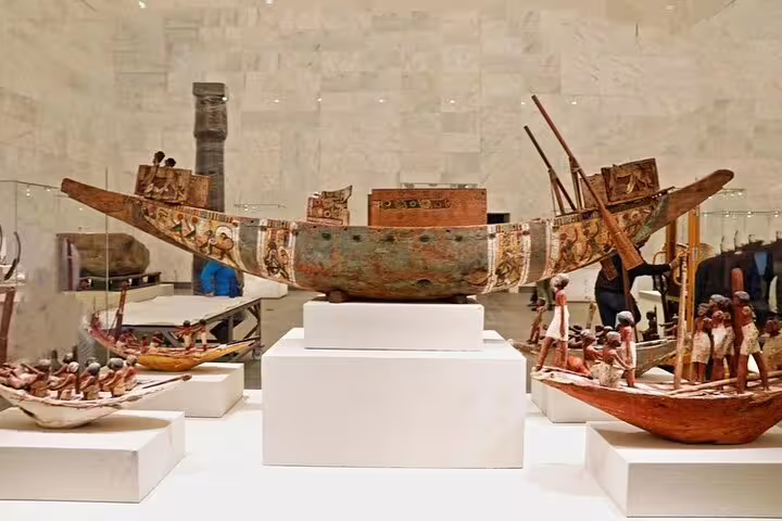 Ancient Egyptian boat models displayed inside the National Museum, included on private Port Said to Giza tour