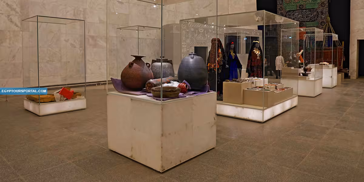 Museum of Egyptian Civilization gallery with pottery and traditional costumes on a private Cairo tour with guide