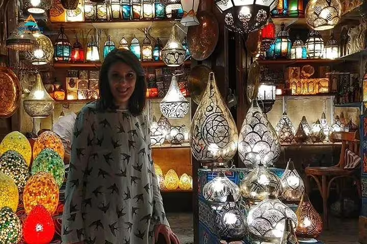 Shopping for colorful Egyptian lanterns at Cairo bazaar on Hurghada to Cairo and Luxor 2-day tour