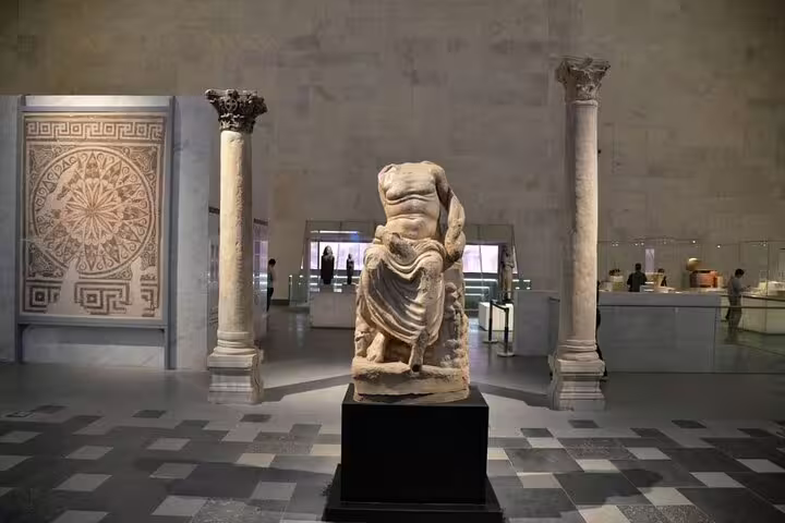 Ancient marble statue and columns at the National Museum of Egyptian Civilization on Alexandria Port tour