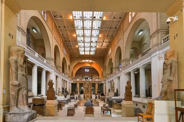 Inside Egyptian Museum Cairo with ancient statues, included in Unique Ancient Egypt Cairo day tour from Hurghada