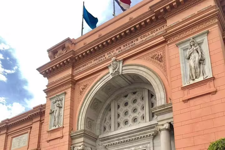 Egyptian Museum Cairo main entrance arch and statues, ideal stop on a 4-hour private guided day tour