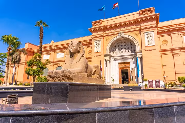 Front of Egyptian Museum Cairo with sphinx statue, book online QR skip-the-line ticket for fast entry