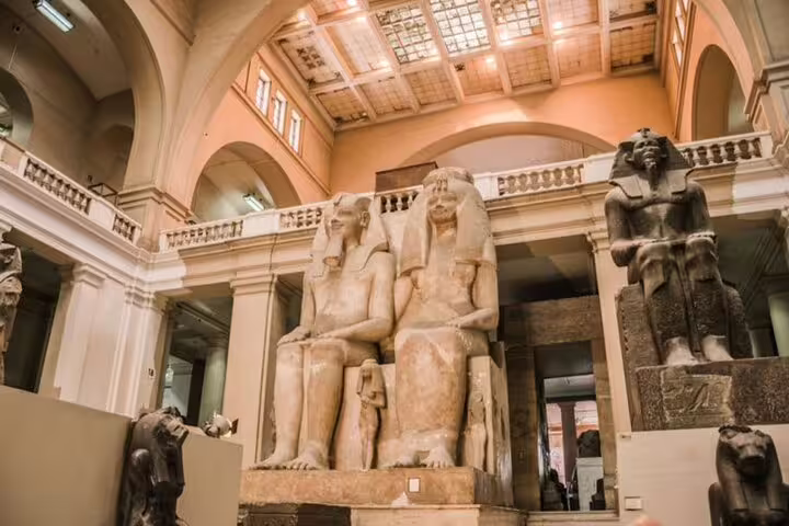 Grand statues inside the Egyptian Museum Cairo, a must-see stop on National Museum and Citadel tour