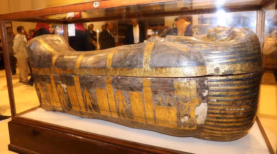 Ancient gilded Egyptian sarcophagus inside the Egyptian Museum on a private Cairo museum tour