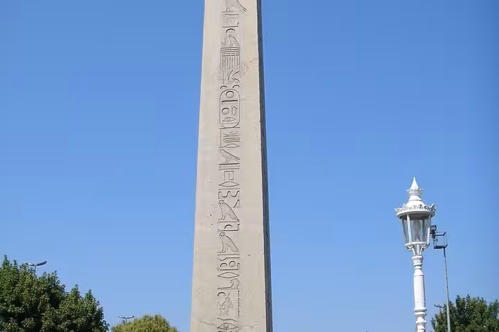 Ancient Egyptian obelisk with hieroglyphs at Sultanahmet Square on a private old city tour by car