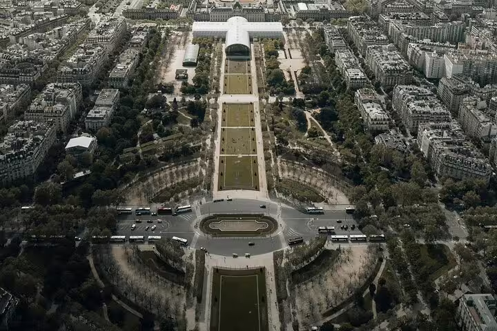 Aerial view of Champ de Mars park and Paris city from the Eiffel Tower
