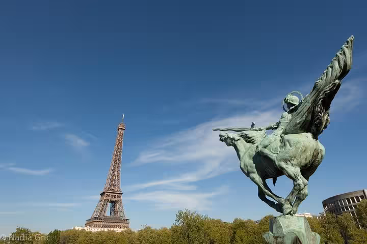 Eiffel Tower view from Paris statue, perfect for a half-day private customized walking tour with transport options