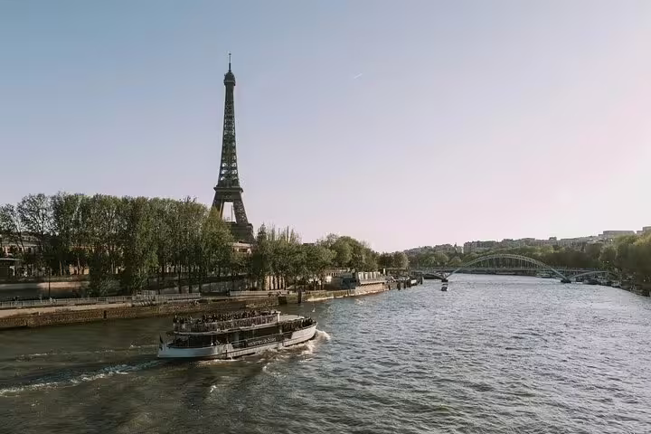 Bateaux Mouches river cruise on the Seine with Eiffel Tower in background, Paris