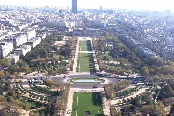 Aerial view of Champ de Mars park and Paris cityline seen from the Eiffel Tower summit