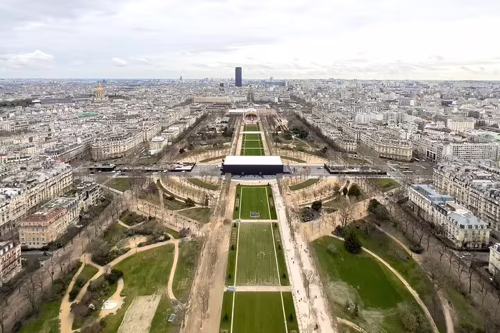 Aerial view of Champ de Mars and Paris cityline from Eiffel Tower top floor