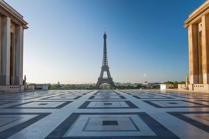 View of the Eiffel Tower from Trocadero plaza in Paris on a clear sunny day