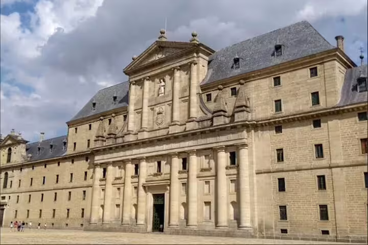 Facade of El Escorial Monastery near Madrid, featured stop on a private minivan tour to Segovia