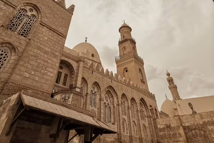 Old Cairo mosque facade along El-Muizz Street, featured on Islamic Cairo walking tour with Cairo Tower dinner