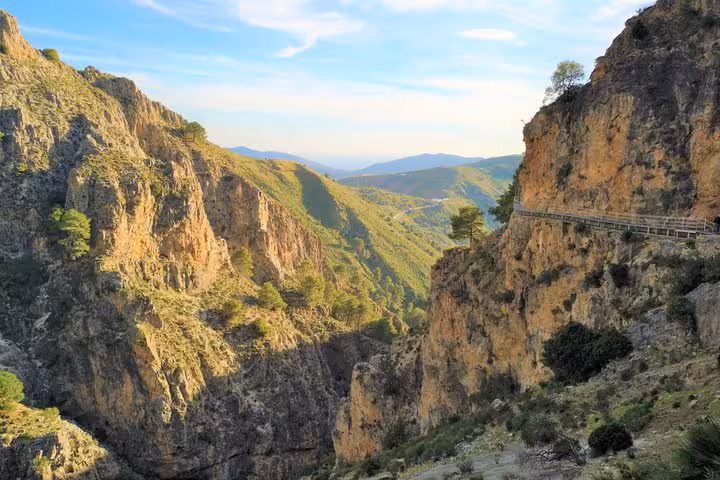 Breathtaking view of El Saltillo Gorge cliffs and trail, perfect for hiking tours from Malaga.