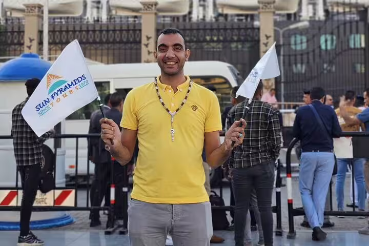 Tour guide welcoming guests for El Sokhna Port to Giza Pyramids and Cairo day trip with Nile lunch cruise