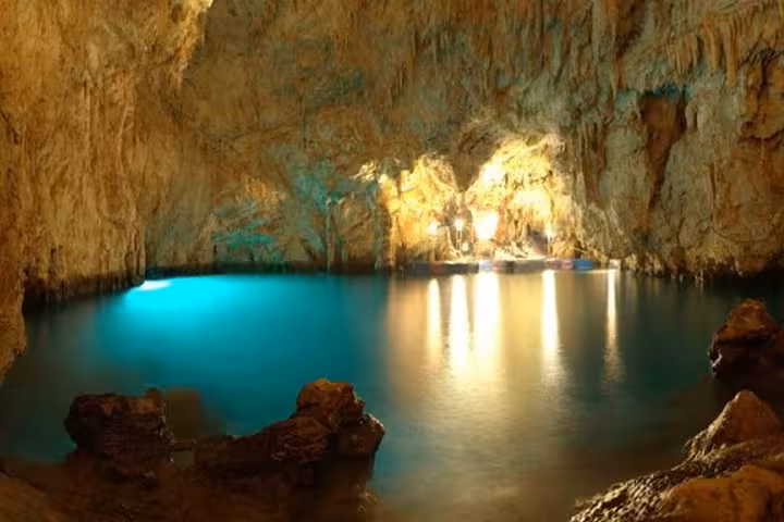 Discover the enchanting Emerald Grotto with its glowing turquoise waters and stunning stalactites on our Amalfi tour.