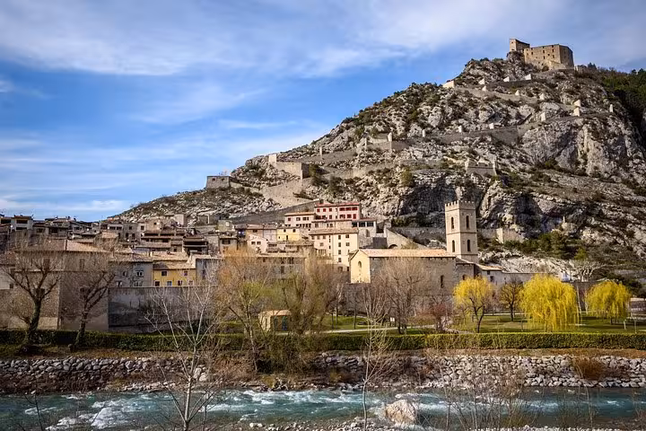 Picturesque view of Entrevaux village and its historic fortifications on the Fabulous Red Canyon full day tour.