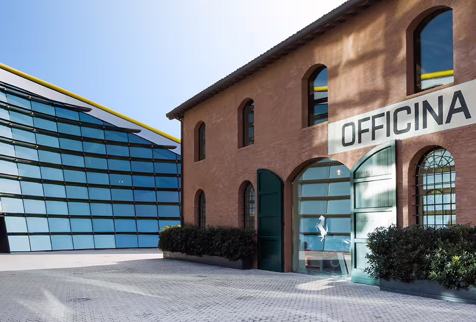 Entrance to Enzo Ferrari Museum Modena officina building, included with Bologna supercar museum ticket