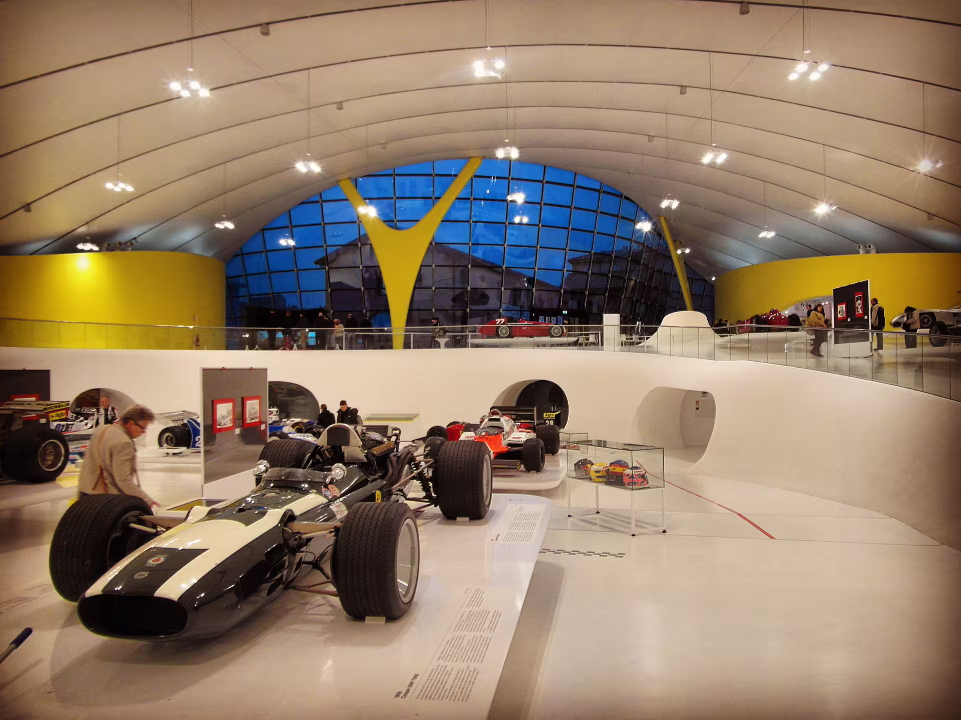 F1 race cars on display inside the Enzo Ferrari Museum Modena, included with entrance ticket tour