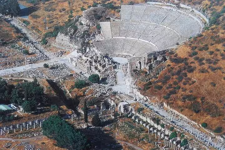 Discover the grand ruins of Ephesus with an aerial view highlighting the amphitheater on a day excursion from Kusadasi.