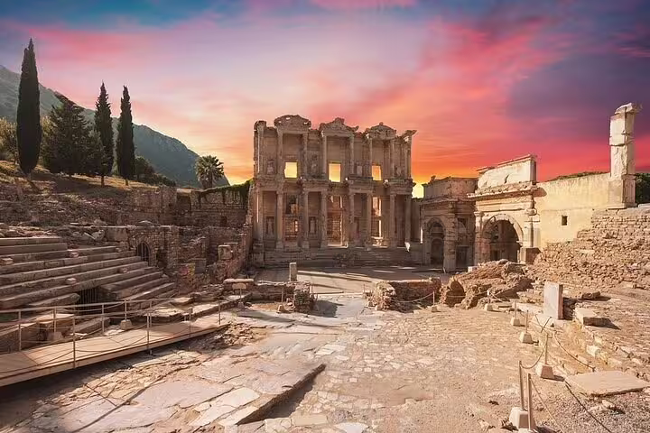 Explore the ancient ruins of Ephesus at sunset on a skip-the-line tour from Kusadasi Port, highlighting historic architecture.