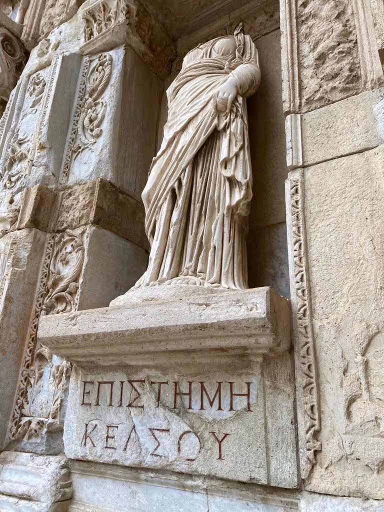 Ephesus ancient statue with Greek inscription, highlight of Bodrum to Ephesus private tour with Terrace Houses