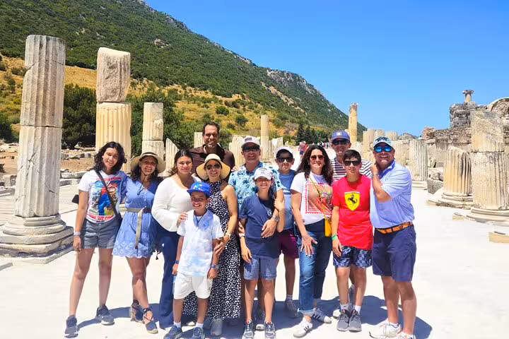 Group photo among ancient columns at Ephesus on a 2-day Ephesus Aphrodisias and Pamukkale guided tour