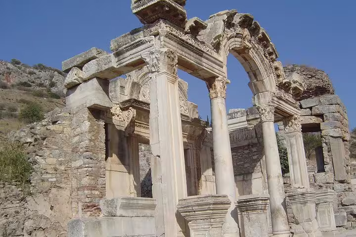 Curetes Street arch and marble columns in Ancient Ephesus ruins on a private all inclusive tour