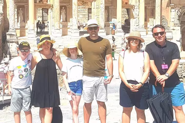 Happy tourists enjoying a sunny day at Ephesus, captured on the Half Day Tour from Kusadasi or Selcuk hotels.