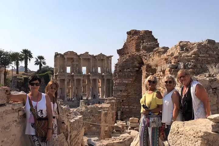 Group photo overlooking Ephesus ruins with Library of Celsus on Bodrum to Ephesus and House of Mary tour