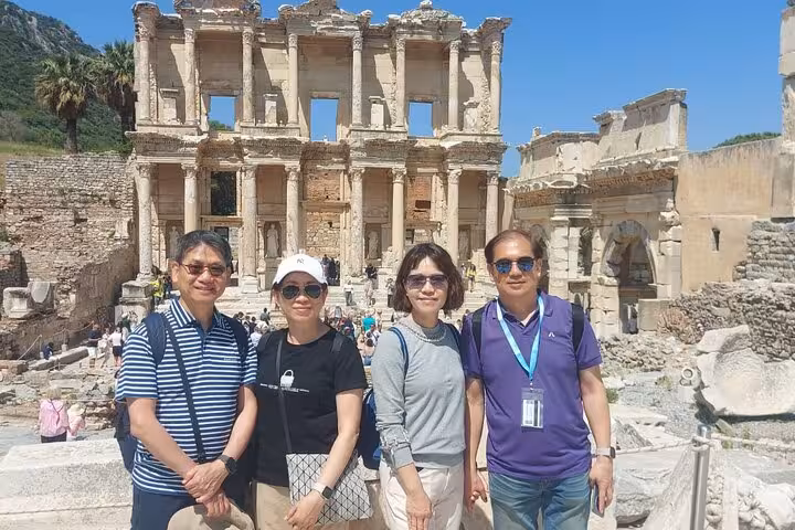 Friends posing by the Library of Celsus in Ephesus, small group tour with House of Mary visit and lunch