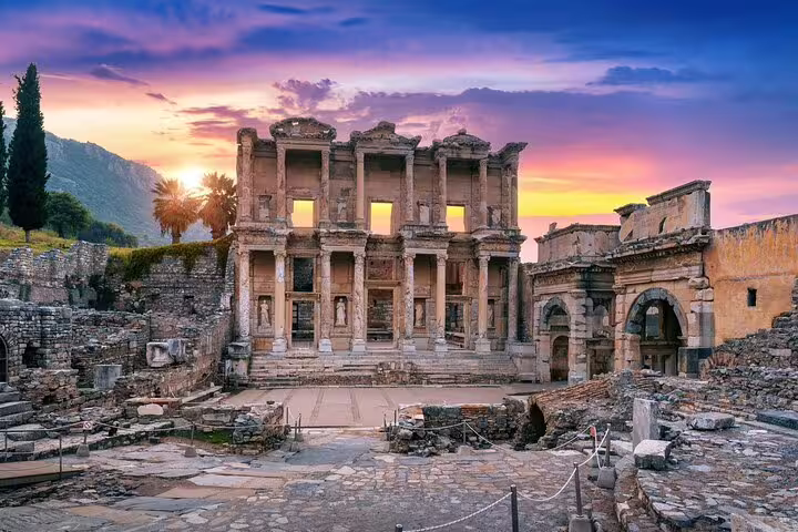Sunset view of the ancient Library of Celsus in Ephesus, highlighting the grandeur of Roman architecture.