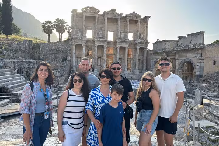 Small group photo at Ephesus Library of Celsus ruins, guided highlight on 5 Days Turkey tour