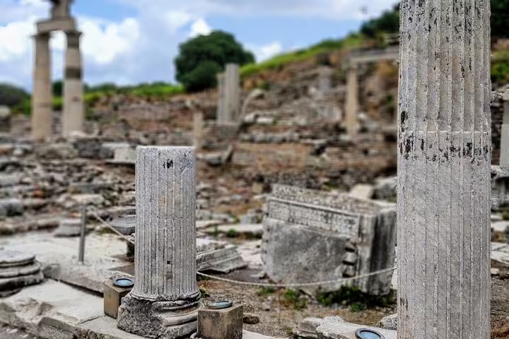 Close-up of marble columns and ruins at Ephesus archaeological site on 2-day mini group tour from Kusadasi