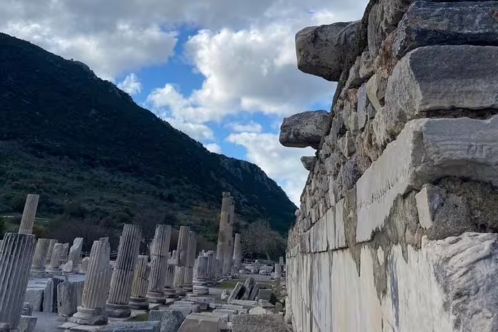 Marble columns and ancient wall along Ephesus ruins on private Ephesus tour including St John Basilica and lunch
