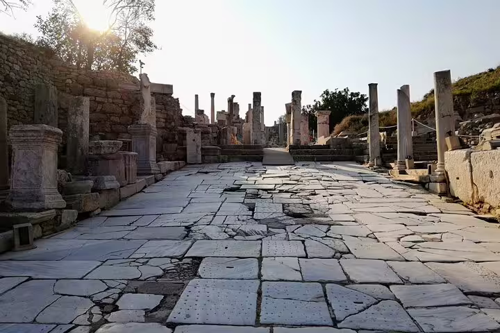 Sunlit marble street ruins in Ephesus on a full-day private tour from Istanbul with domestic flights