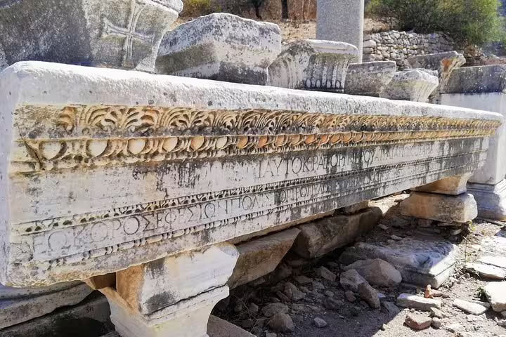 Ancient marble sarcophagus with Greek inscription at Ephesus, highlight on small group cruise tour