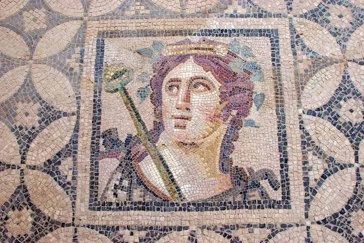 Mosaic artwork depicting a historical figure in Ephesus, a highlight of the skip-the-line private tour from Kusadasi Port.