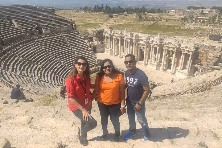 Travelers at Ephesus Grand Theatre and Library of Celsus viewpoint on 2-day Ephesus Pamukkale tour