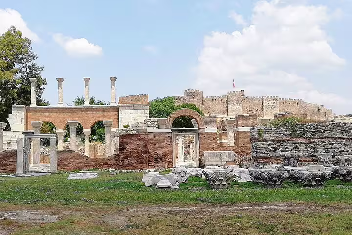 Ephesus ancient ruins with arches and columns on a private 4–6 hour tour from Kusadasi, no hidden fees