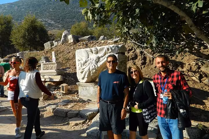 Guests with guide at Ephesus archaeological ruins on a private tour from Kusadasi/Ephesus Port