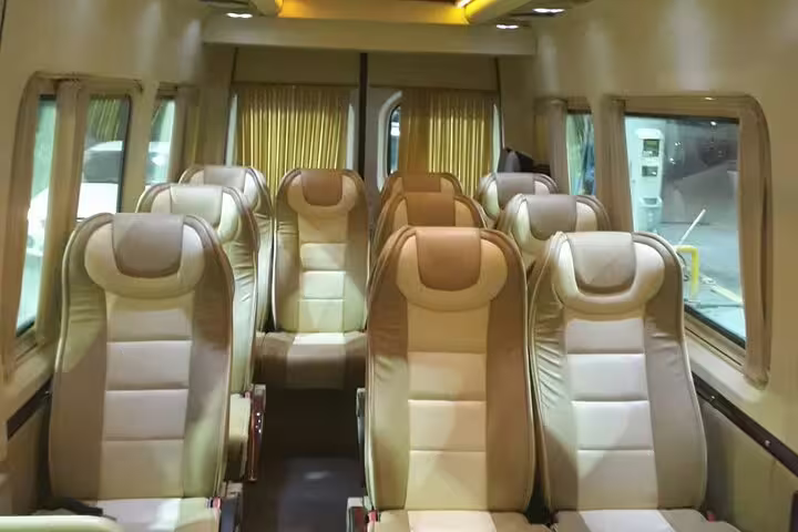 Comfortable leather seats inside private tour minibus for Ephesus and House of Virgin Mary, no hidden fees